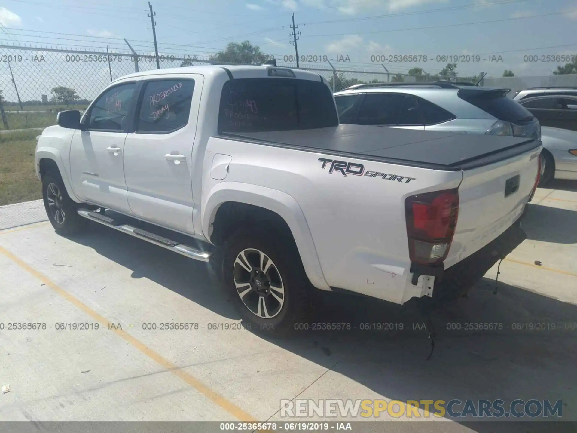 3 Photograph of a damaged car 5TFAZ5CN6KX072457 TOYOTA TACOMA 2019