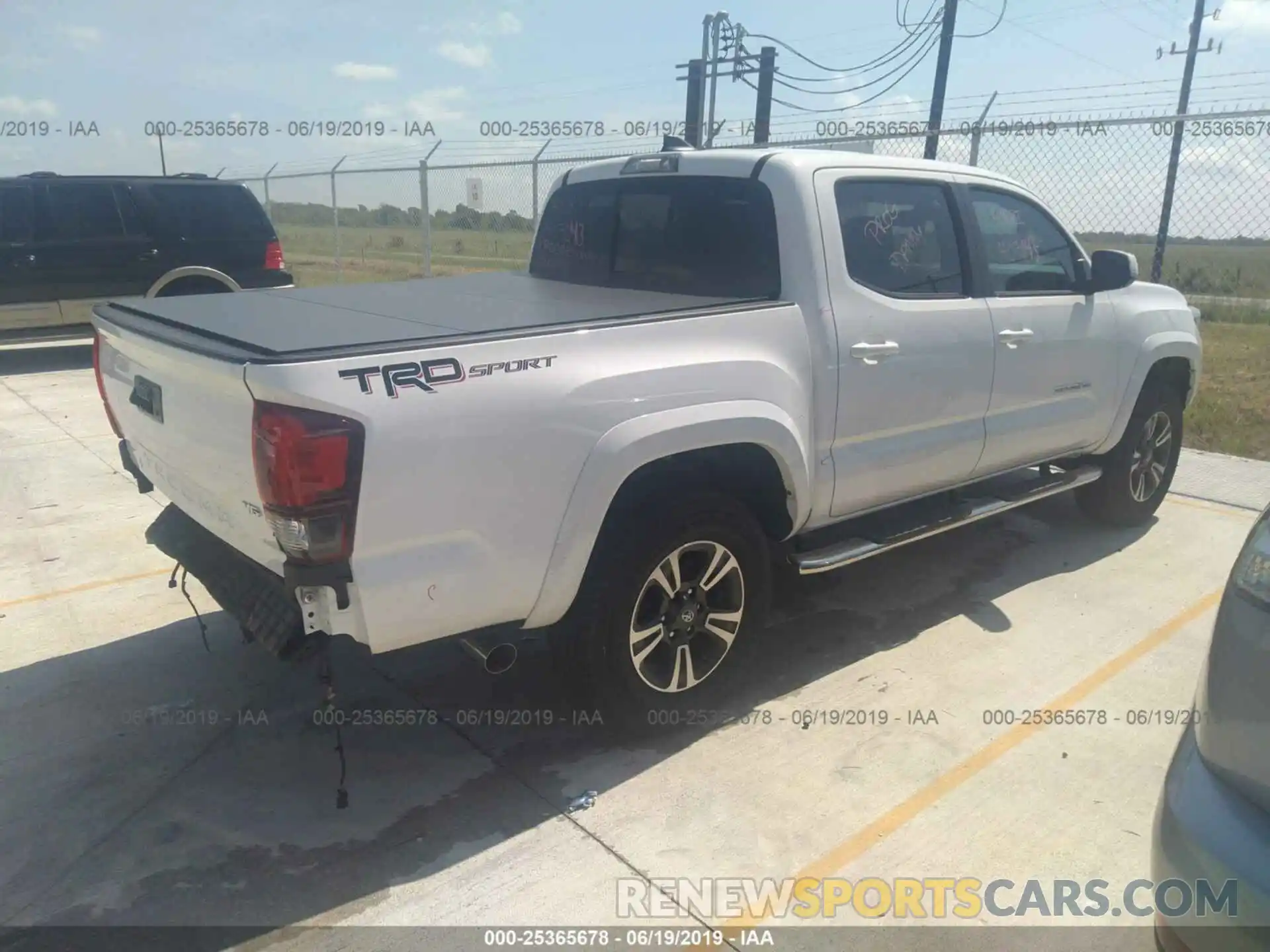 4 Photograph of a damaged car 5TFAZ5CN6KX072457 TOYOTA TACOMA 2019