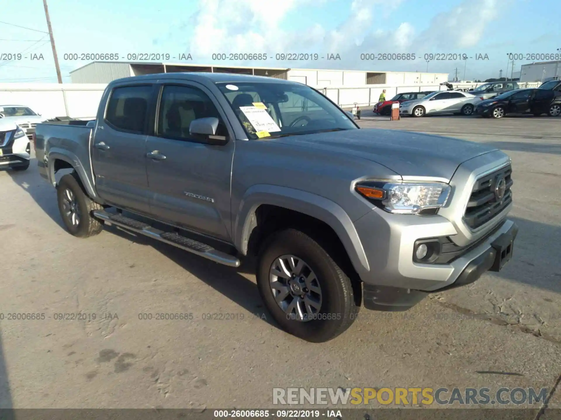 1 Photograph of a damaged car 5TFAZ5CN6KX073477 TOYOTA TACOMA 2019