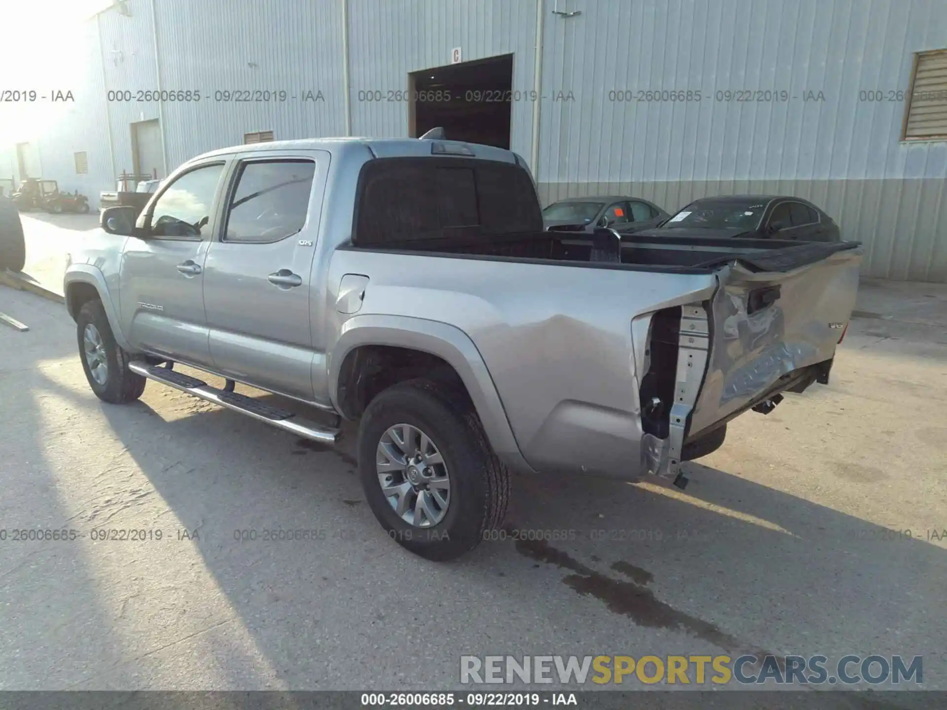 3 Photograph of a damaged car 5TFAZ5CN6KX073477 TOYOTA TACOMA 2019