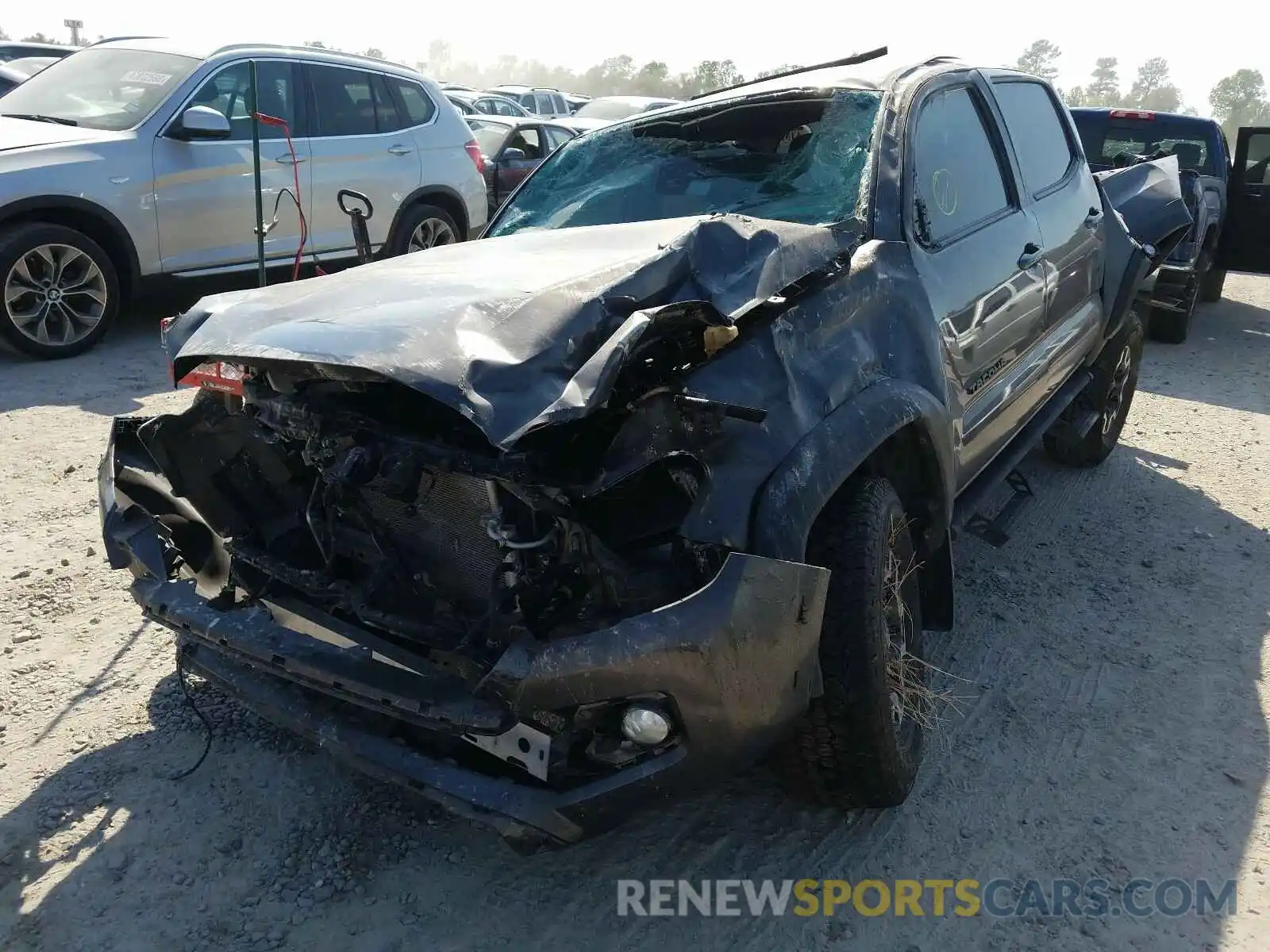 2 Photograph of a damaged car 5TFAZ5CN6KX076301 TOYOTA TACOMA 2019