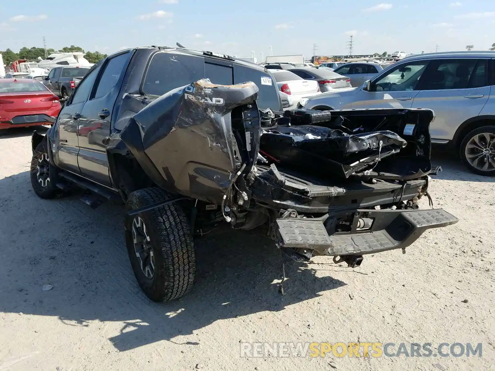 3 Photograph of a damaged car 5TFAZ5CN6KX076301 TOYOTA TACOMA 2019