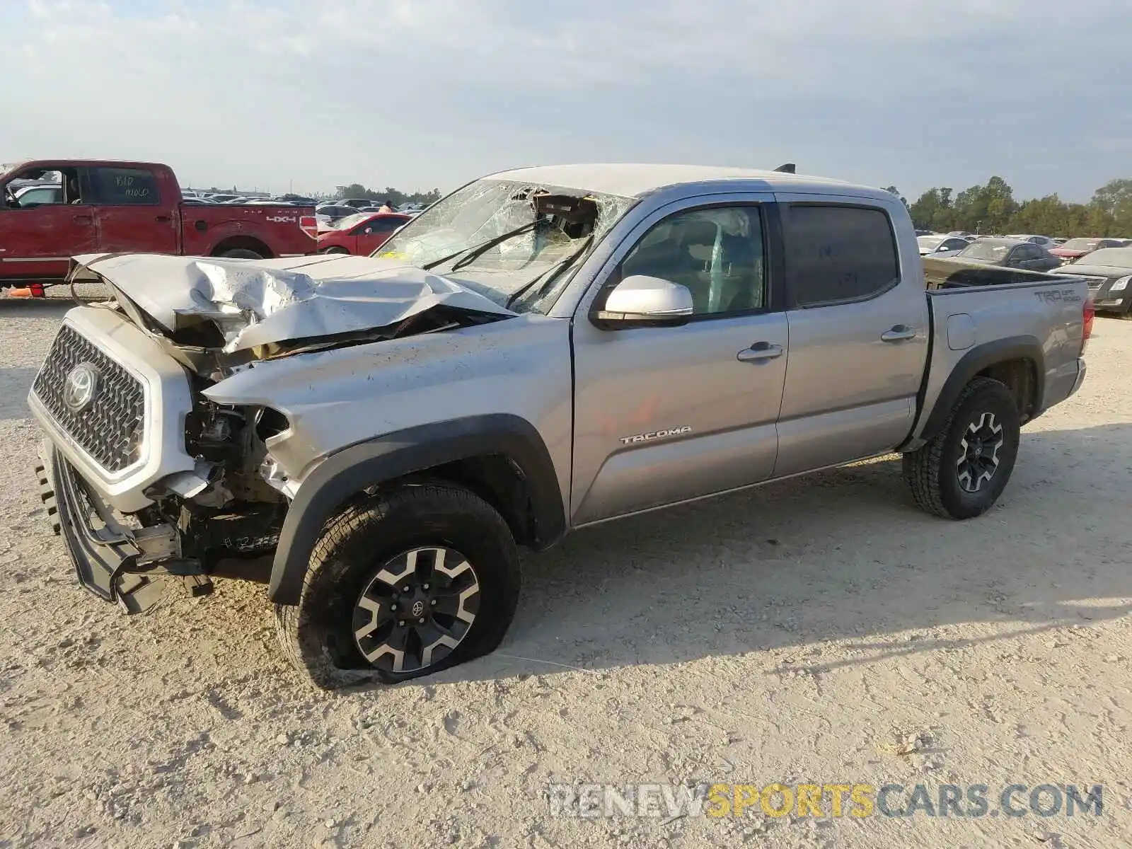 2 Photograph of a damaged car 5TFAZ5CN6KX079585 TOYOTA TACOMA 2019