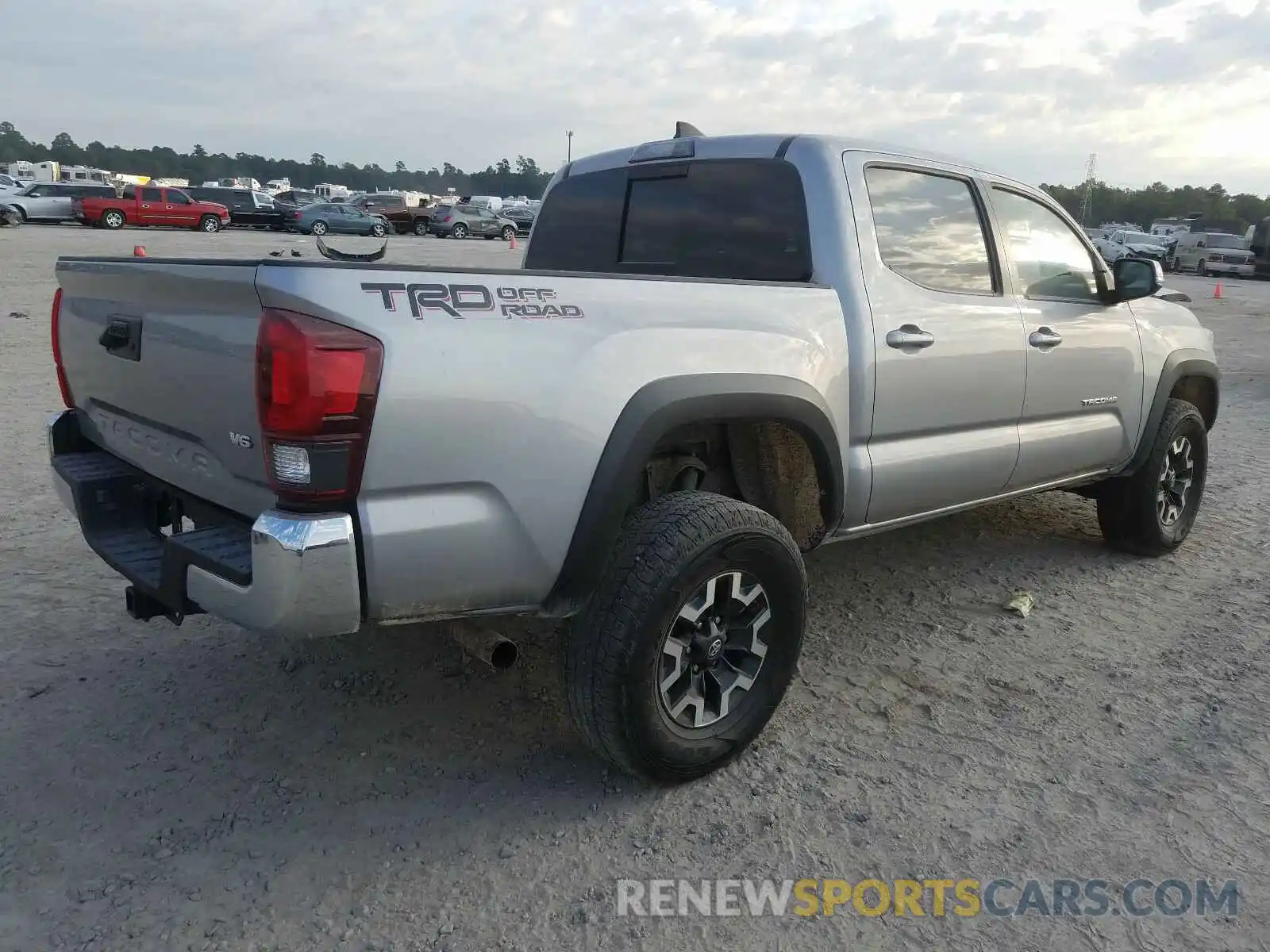 4 Photograph of a damaged car 5TFAZ5CN6KX079585 TOYOTA TACOMA 2019