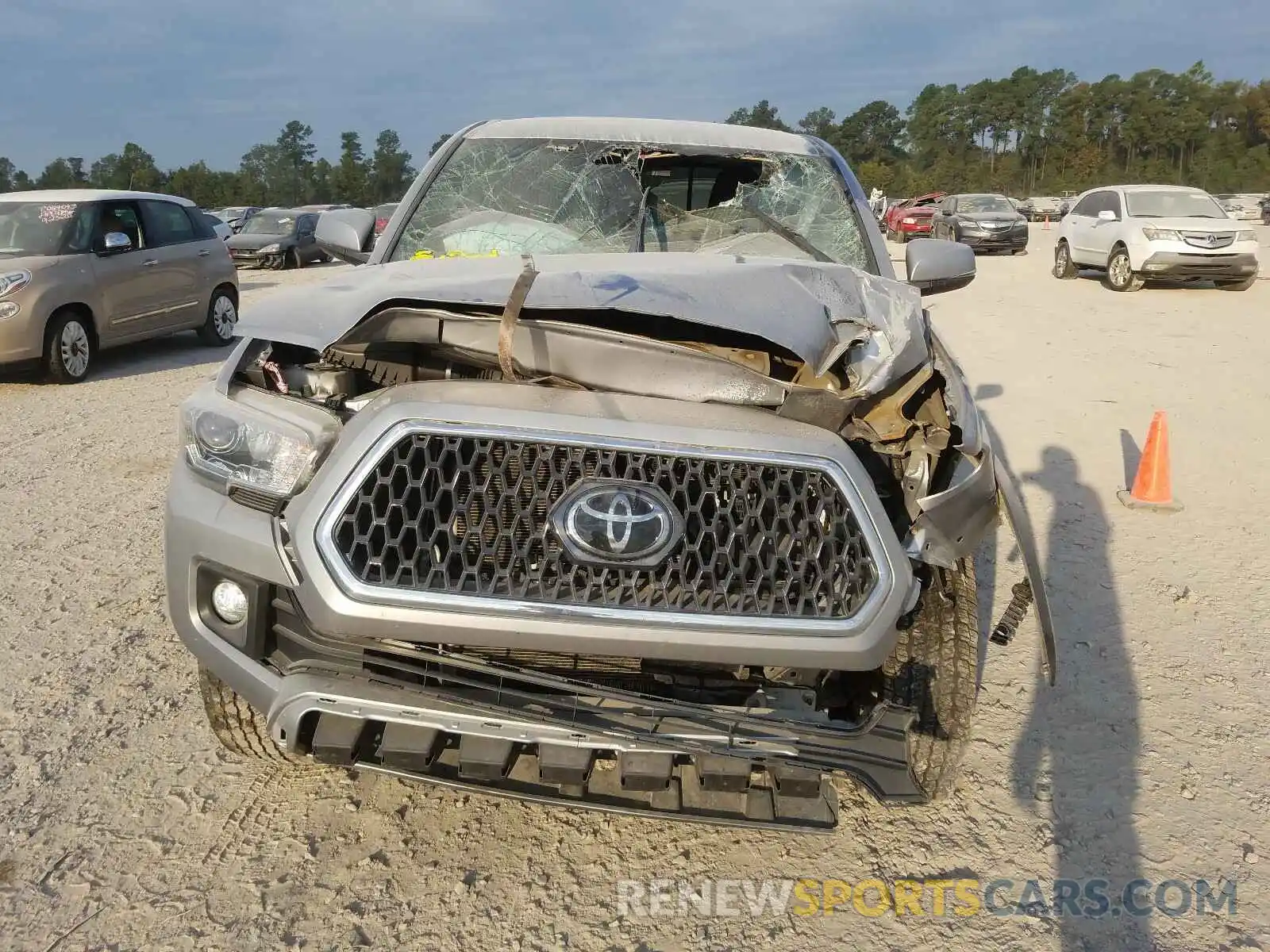 9 Photograph of a damaged car 5TFAZ5CN6KX079585 TOYOTA TACOMA 2019