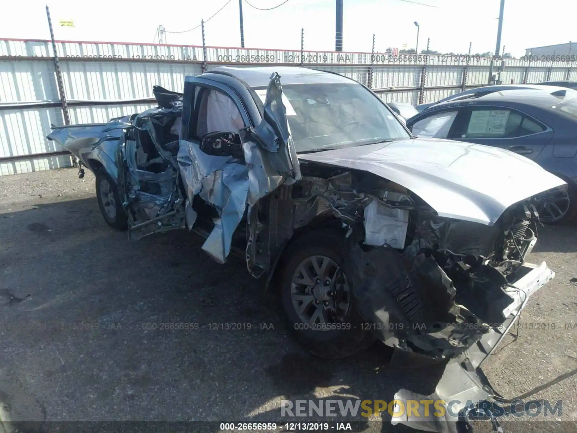 1 Photograph of a damaged car 5TFAZ5CN6KX082261 TOYOTA TACOMA 2019