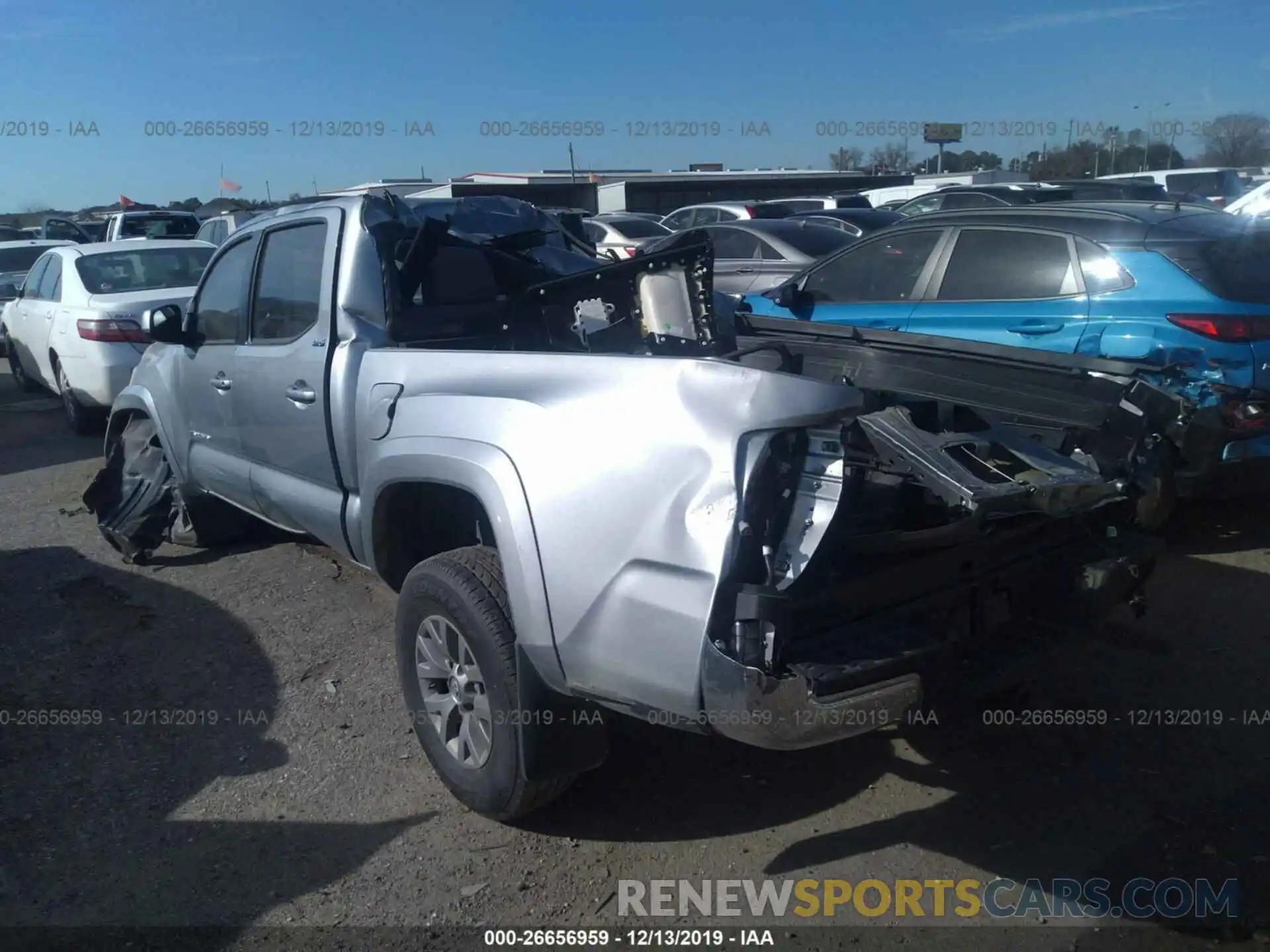 3 Photograph of a damaged car 5TFAZ5CN6KX082261 TOYOTA TACOMA 2019