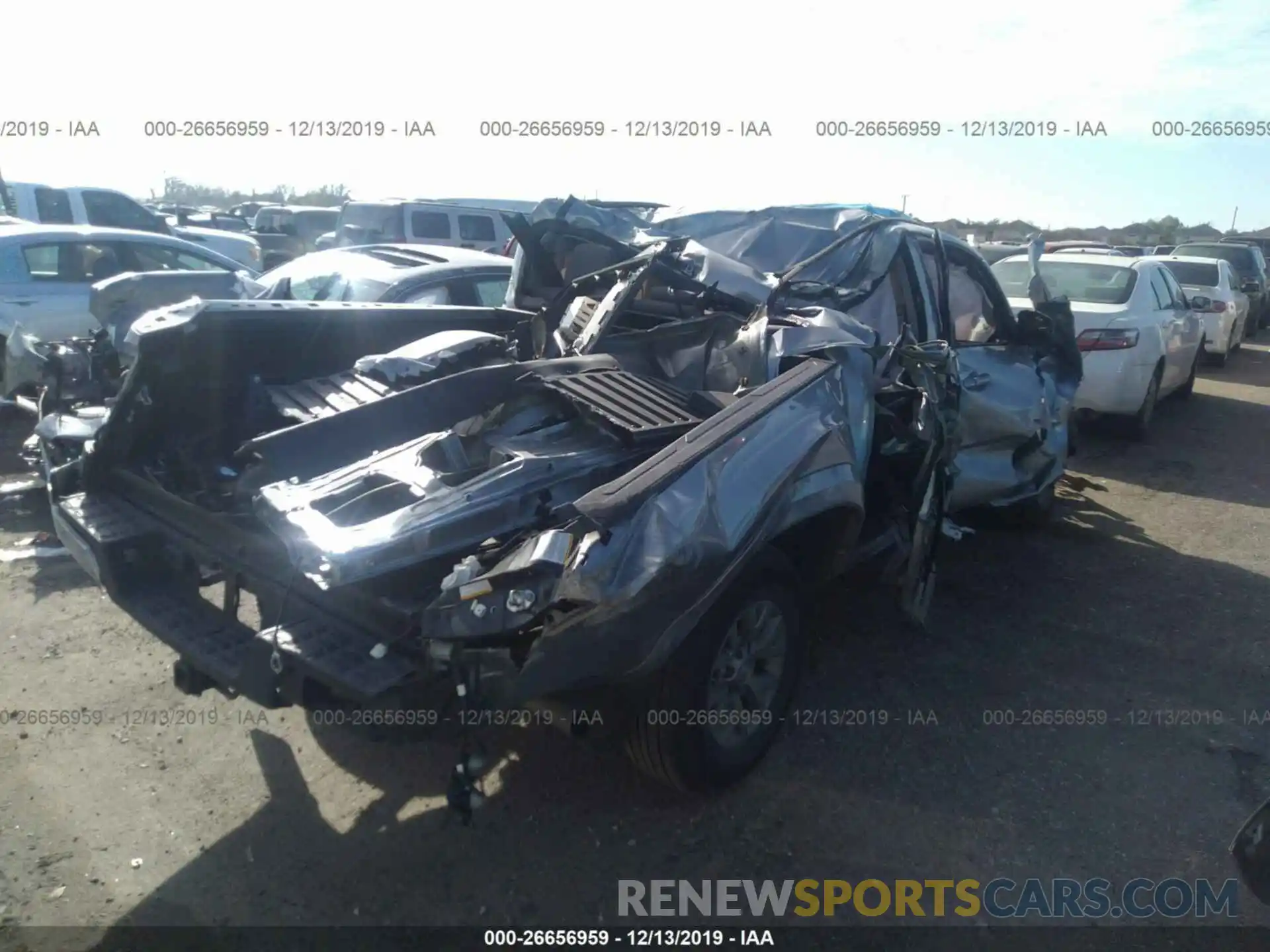 4 Photograph of a damaged car 5TFAZ5CN6KX082261 TOYOTA TACOMA 2019