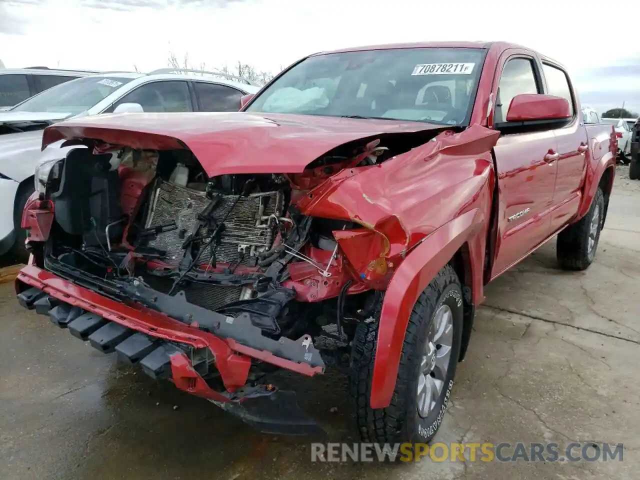 2 Photograph of a damaged car 5TFAZ5CN6KX085919 TOYOTA TACOMA 2019