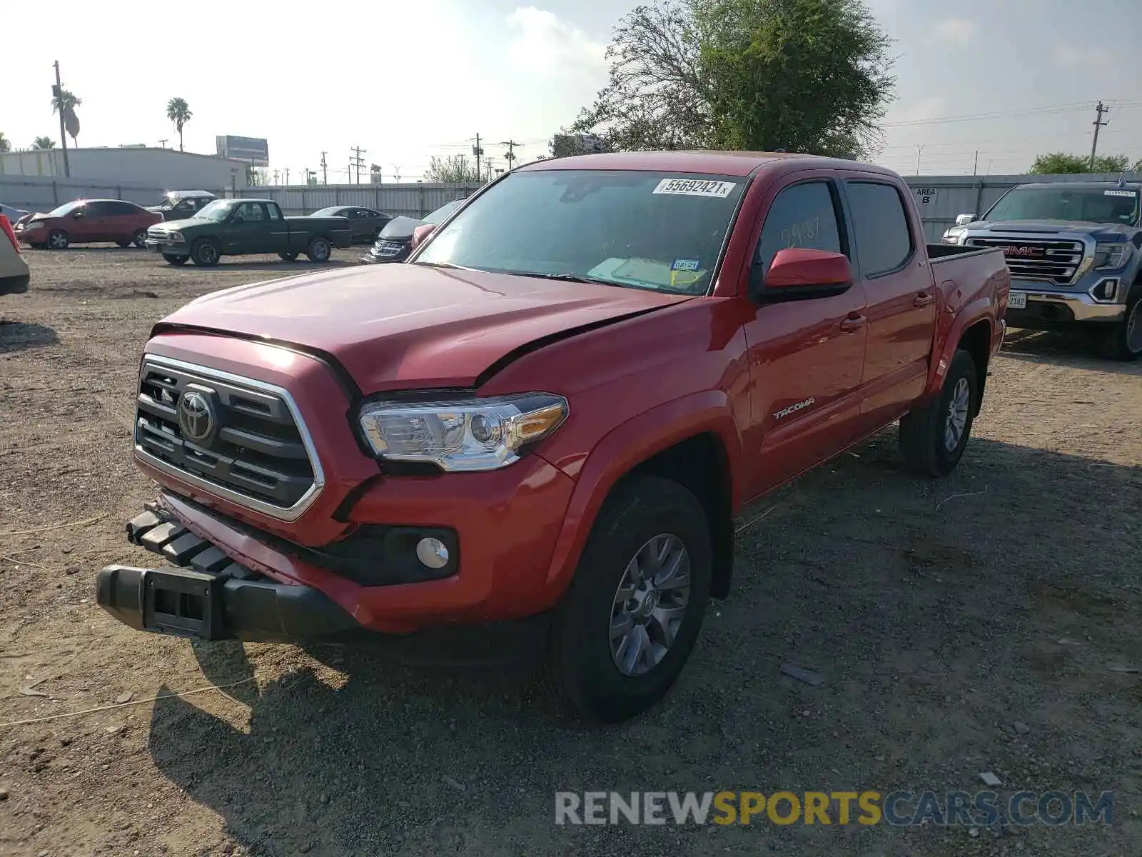 2 Photograph of a damaged car 5TFAZ5CN6KX086150 TOYOTA TACOMA 2019