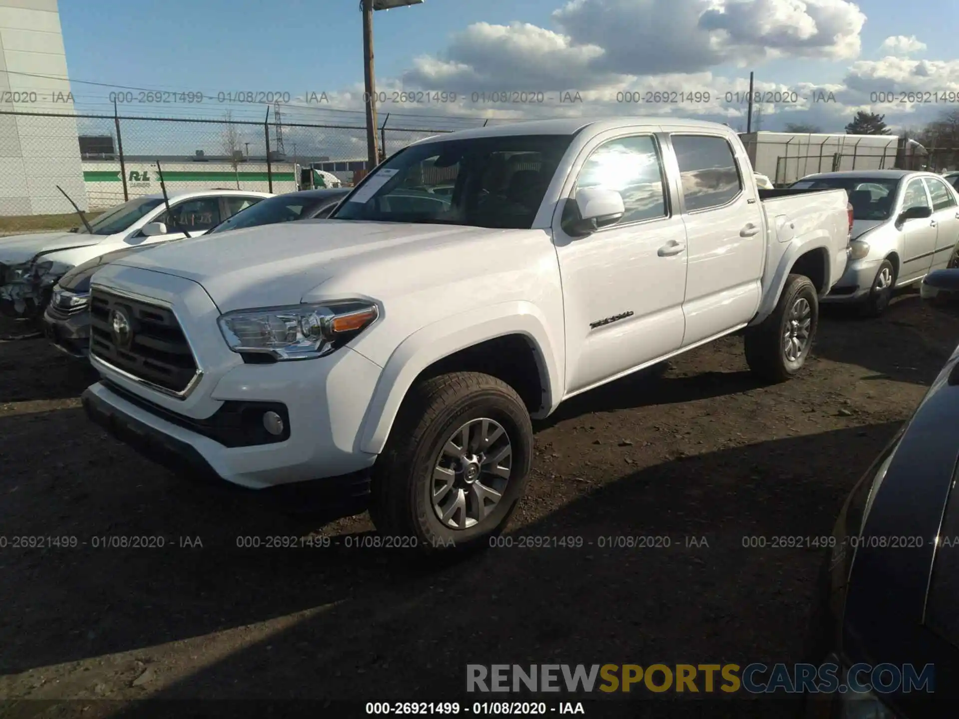 2 Photograph of a damaged car 5TFAZ5CN7KX076565 TOYOTA TACOMA 2019