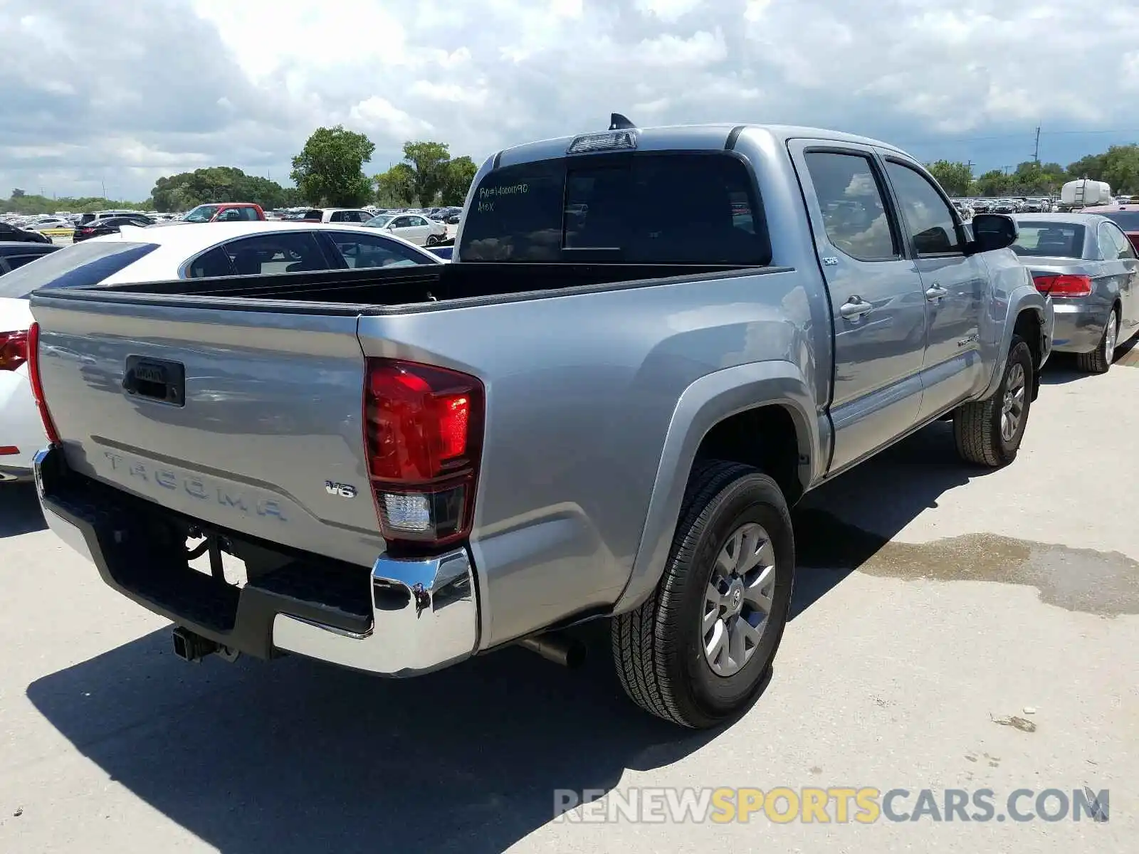 4 Photograph of a damaged car 5TFAZ5CN7KX078820 TOYOTA TACOMA 2019