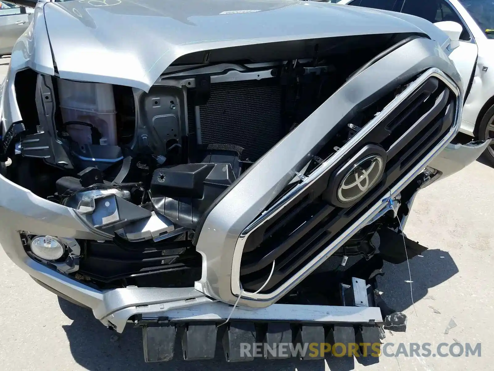 9 Photograph of a damaged car 5TFAZ5CN7KX078820 TOYOTA TACOMA 2019