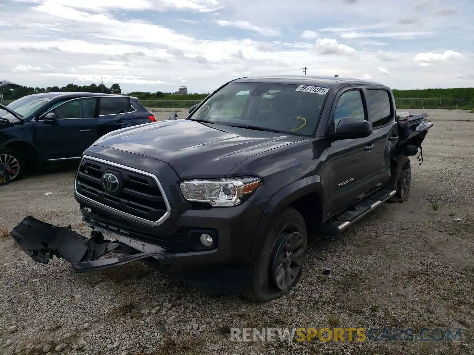 2 Photograph of a damaged car 5TFAZ5CN7KX080339 TOYOTA TACOMA 2019