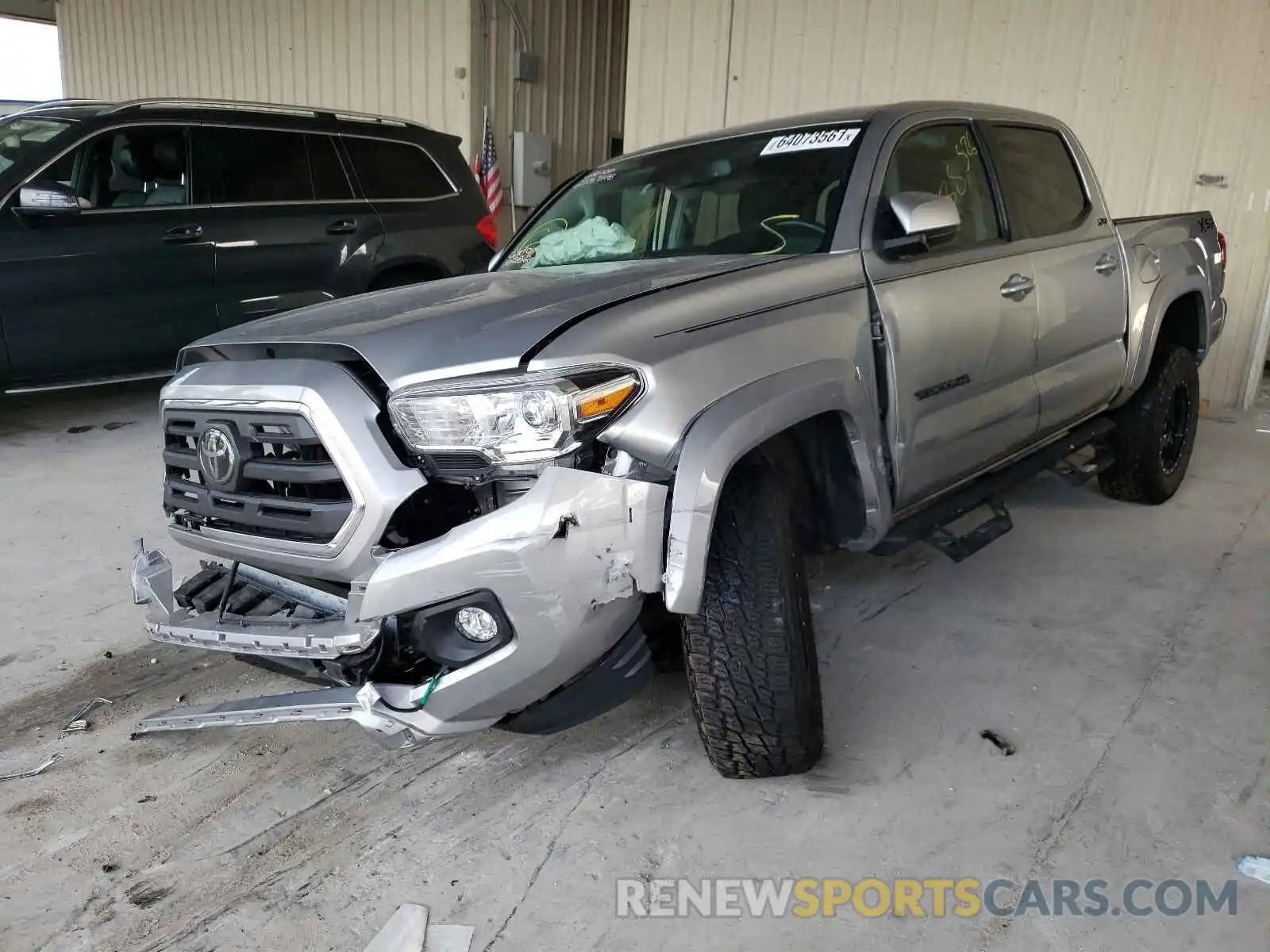 2 Photograph of a damaged car 5TFAZ5CN7KX080471 TOYOTA TACOMA 2019