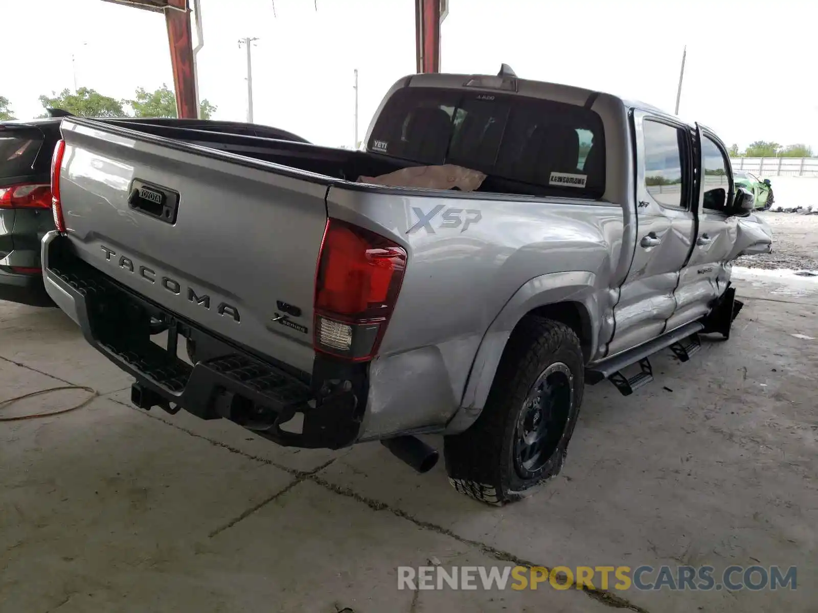 4 Photograph of a damaged car 5TFAZ5CN7KX080471 TOYOTA TACOMA 2019