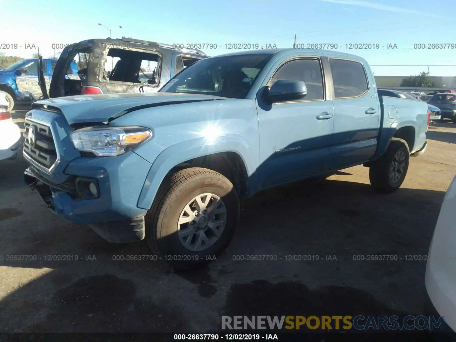 2 Photograph of a damaged car 5TFAZ5CN7KX085136 TOYOTA TACOMA 2019