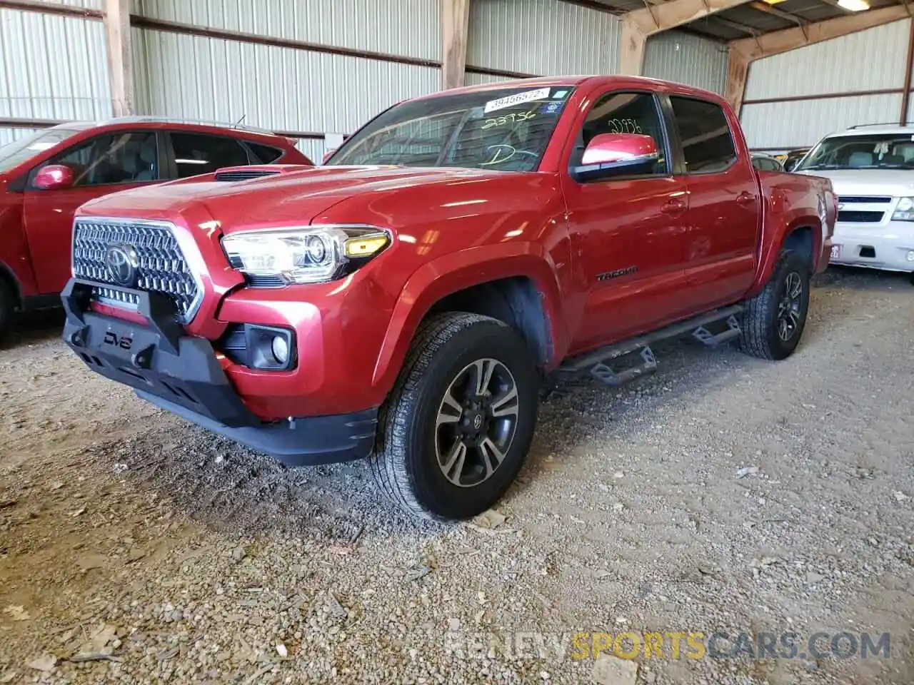 2 Photograph of a damaged car 5TFAZ5CN7KX086142 TOYOTA TACOMA 2019