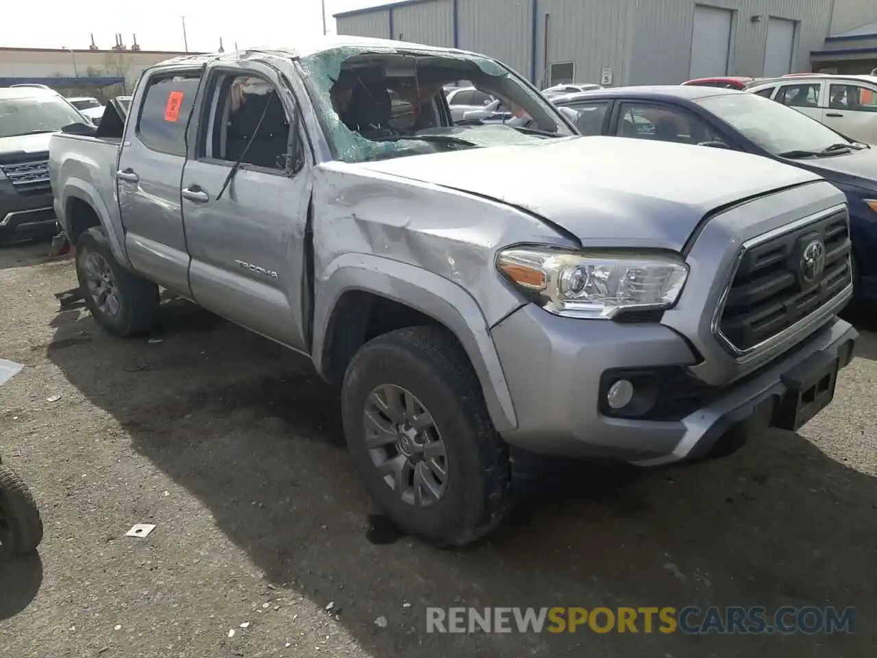 1 Photograph of a damaged car 5TFAZ5CN8KX074310 TOYOTA TACOMA 2019