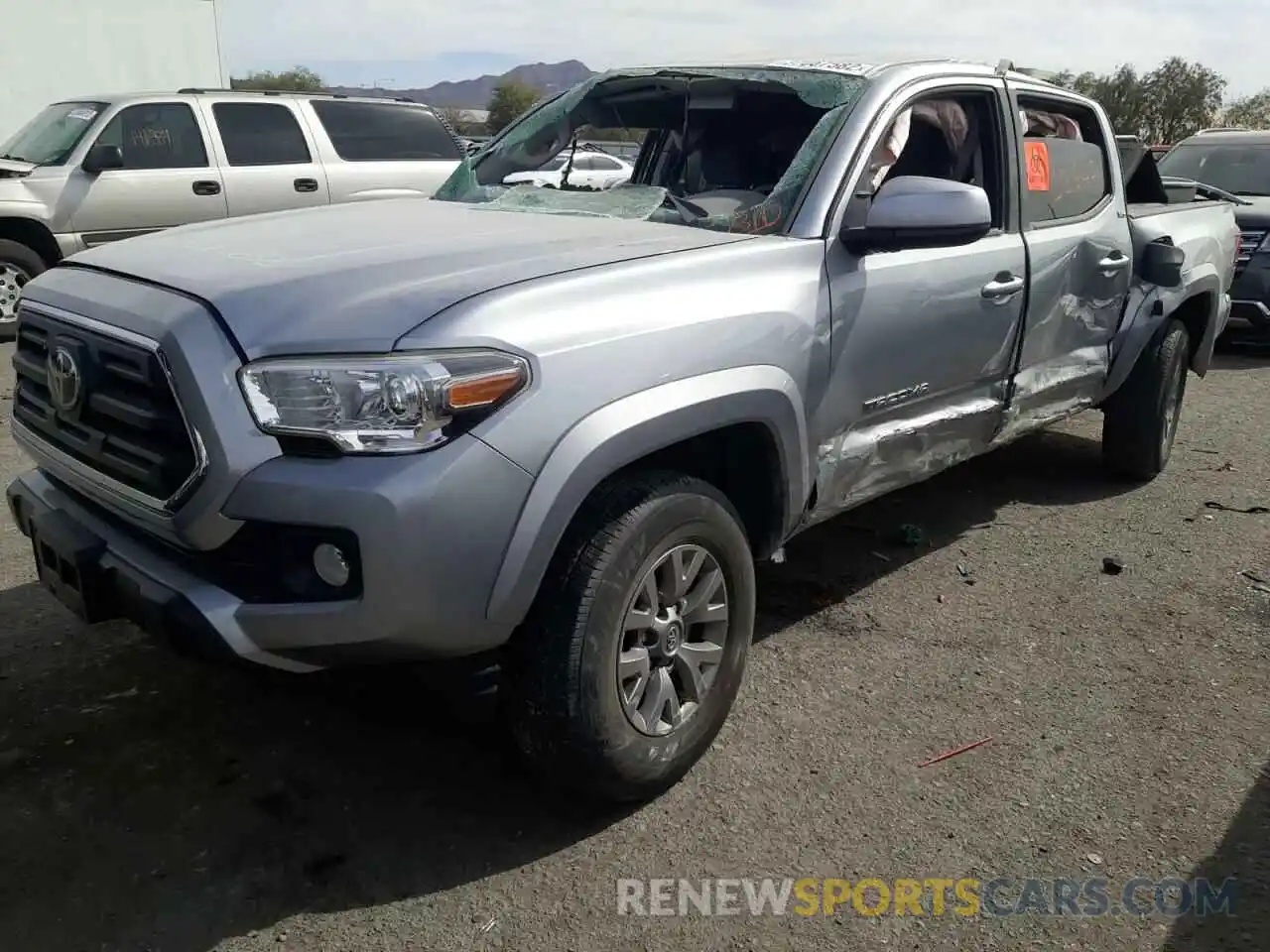 2 Photograph of a damaged car 5TFAZ5CN8KX074310 TOYOTA TACOMA 2019