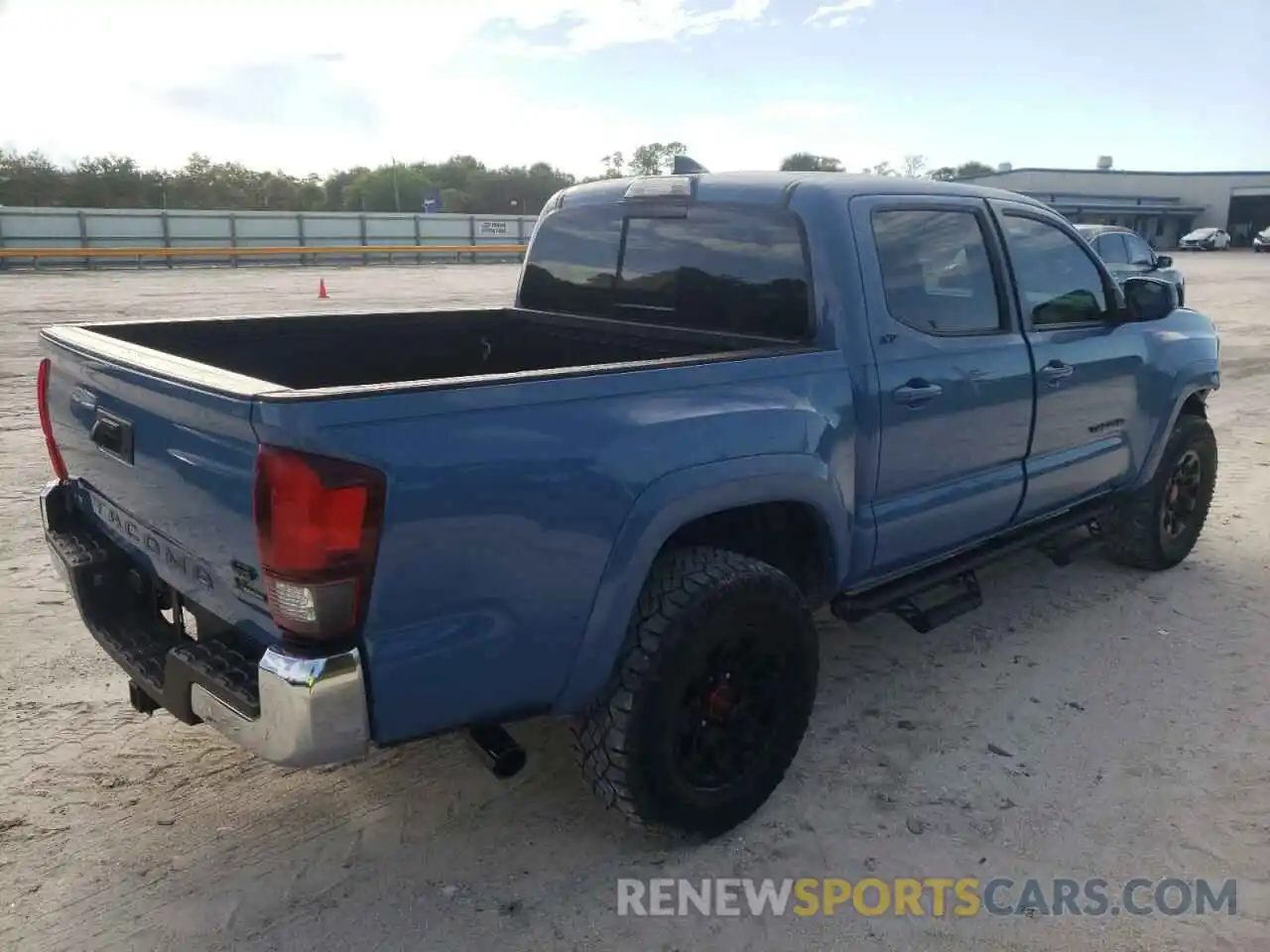 4 Photograph of a damaged car 5TFAZ5CN8KX075358 TOYOTA TACOMA 2019