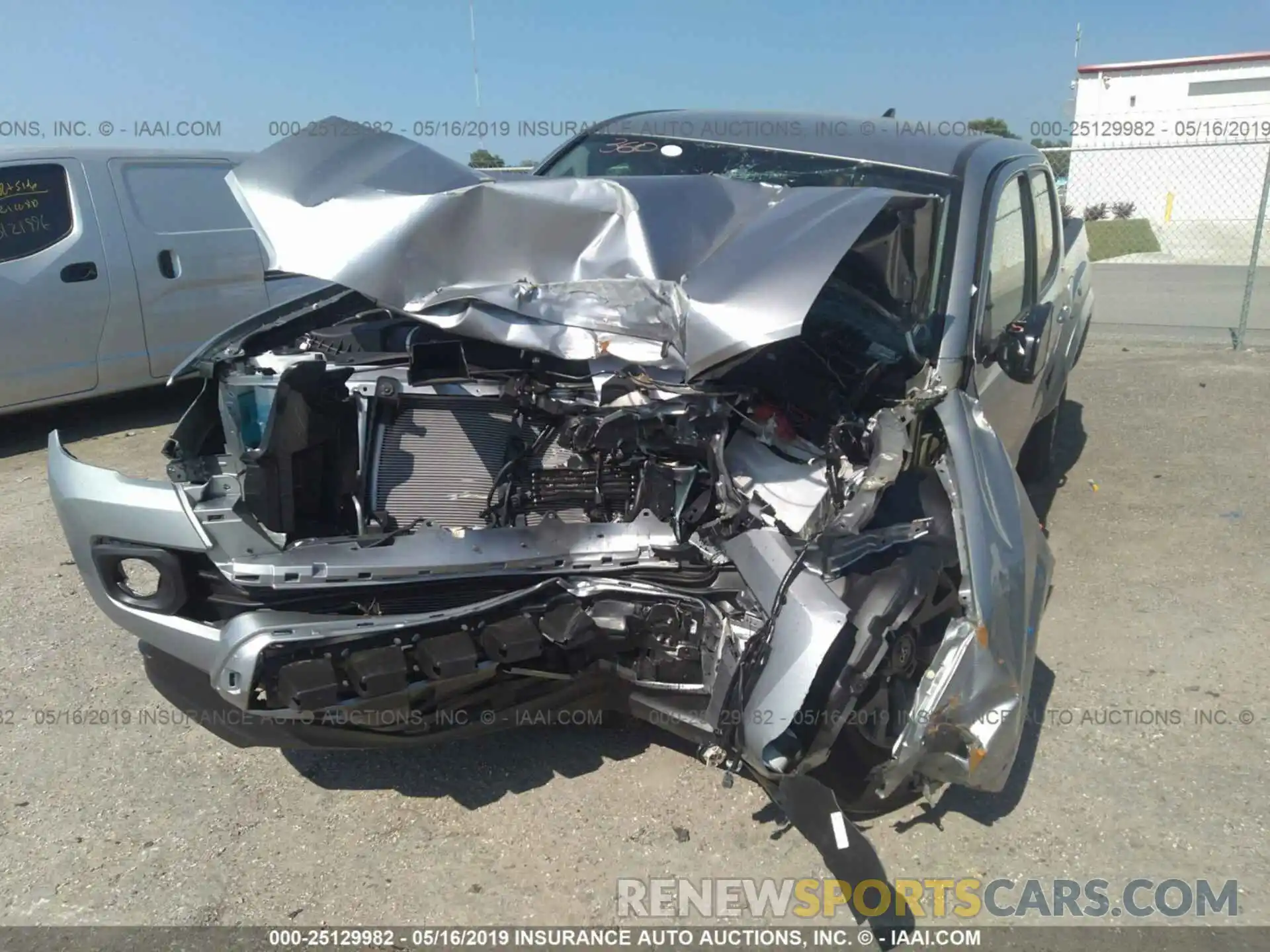 6 Photograph of a damaged car 5TFAZ5CN8KX075506 TOYOTA TACOMA 2019