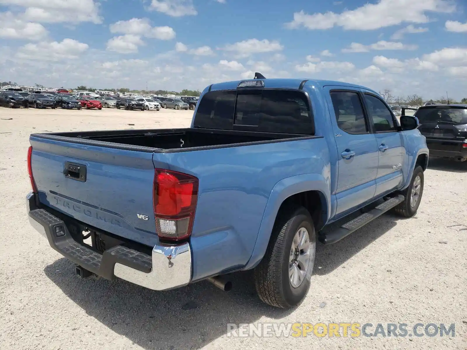 4 Photograph of a damaged car 5TFAZ5CN8KX076154 TOYOTA TACOMA 2019