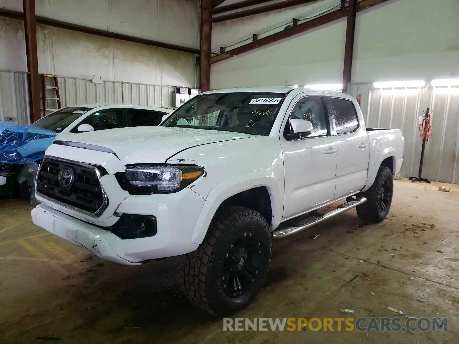 2 Photograph of a damaged car 5TFAZ5CN8KX077448 TOYOTA TACOMA 2019