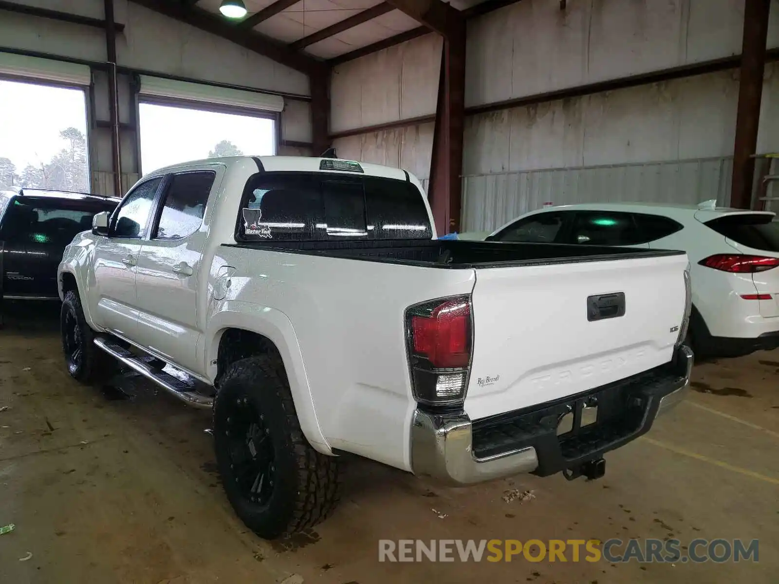 3 Photograph of a damaged car 5TFAZ5CN8KX077448 TOYOTA TACOMA 2019