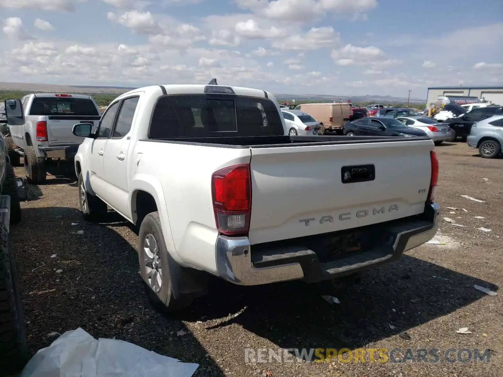 3 Photograph of a damaged car 5TFAZ5CN8KX077756 TOYOTA TACOMA 2019