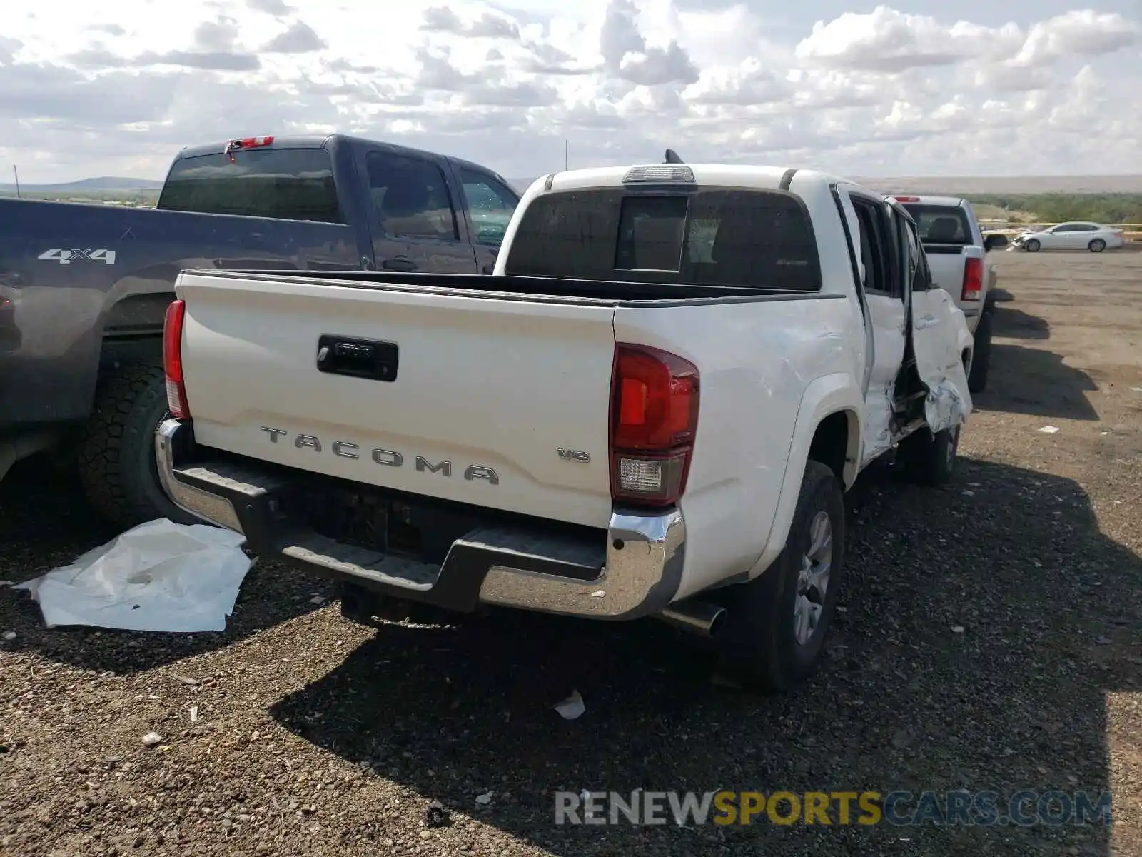 4 Photograph of a damaged car 5TFAZ5CN8KX077756 TOYOTA TACOMA 2019