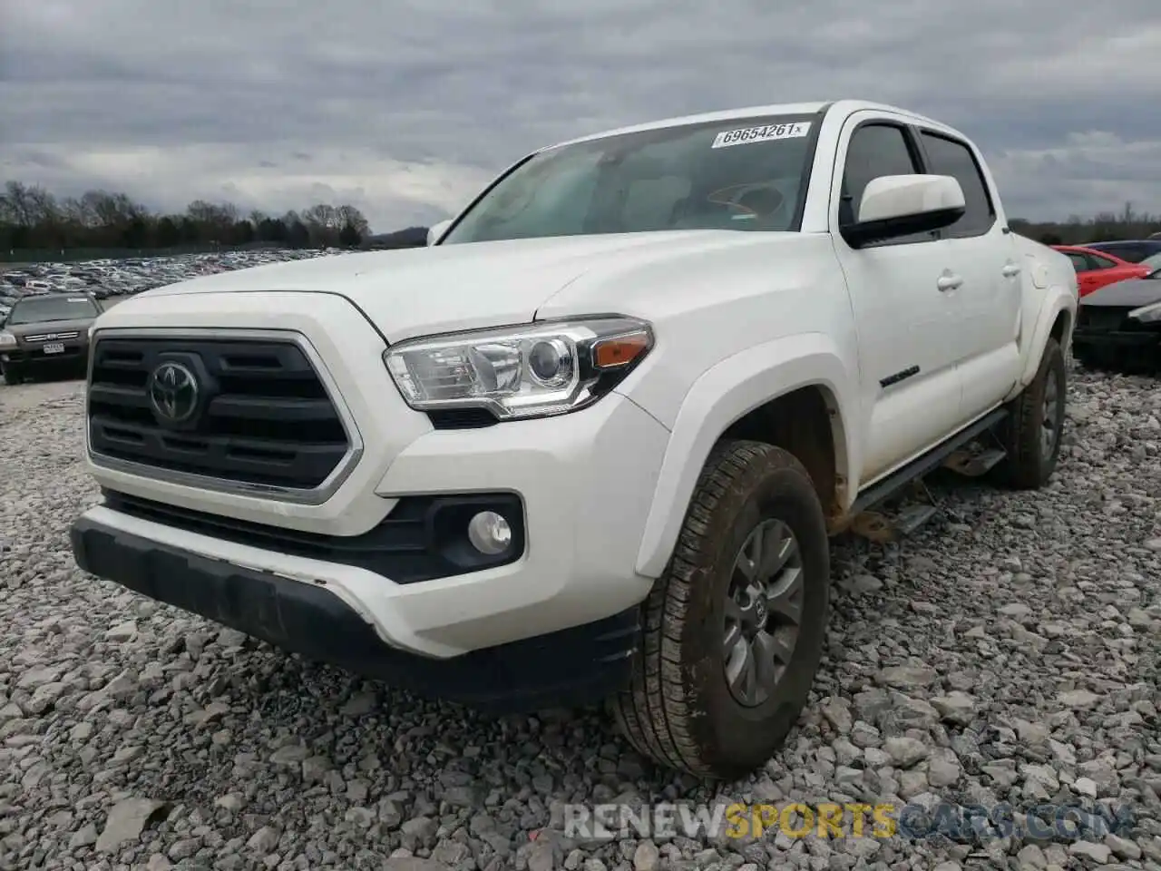 2 Photograph of a damaged car 5TFAZ5CN8KX077921 TOYOTA TACOMA 2019