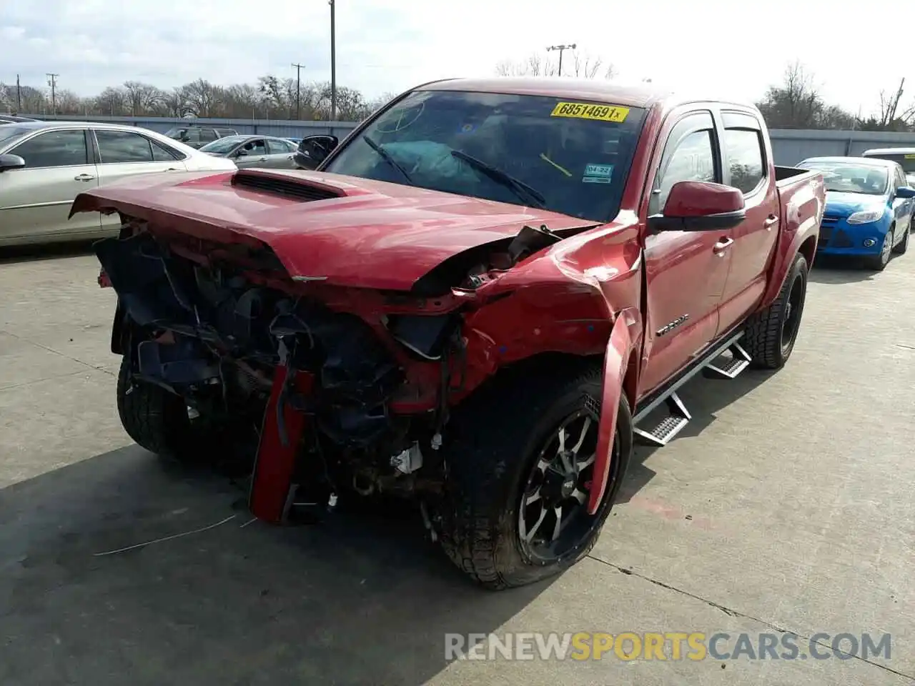 2 Photograph of a damaged car 5TFAZ5CN8KX078499 TOYOTA TACOMA 2019