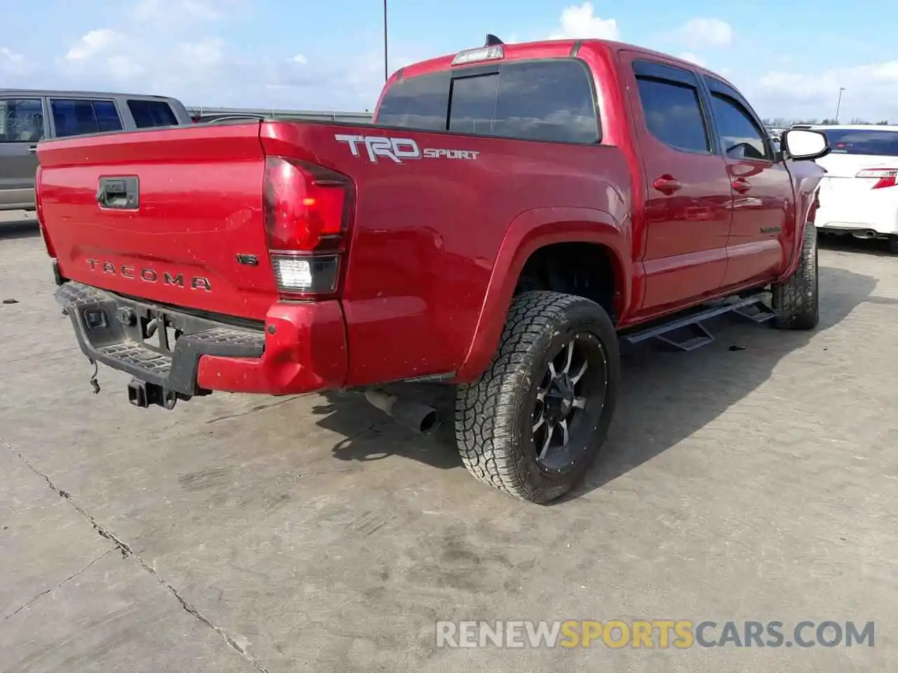 4 Photograph of a damaged car 5TFAZ5CN8KX078499 TOYOTA TACOMA 2019