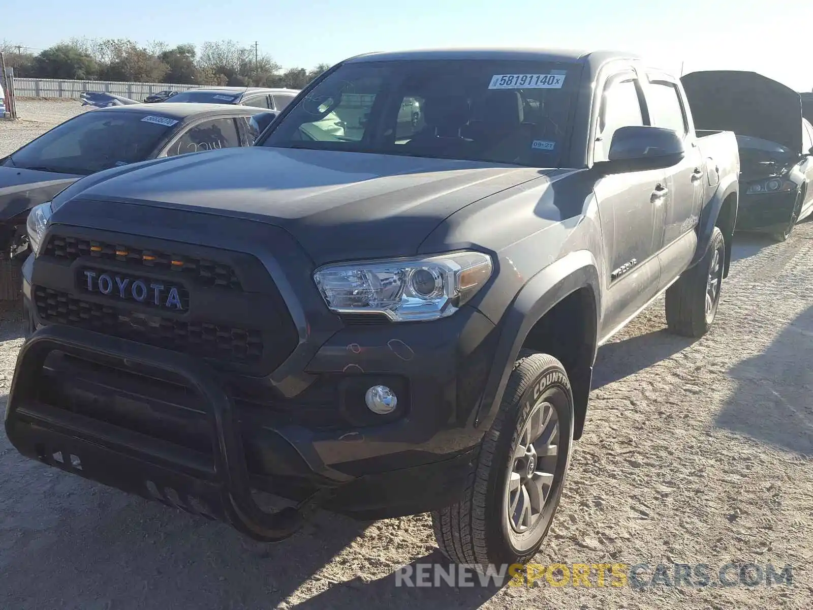 2 Photograph of a damaged car 5TFAZ5CN8KX078776 TOYOTA TACOMA 2019