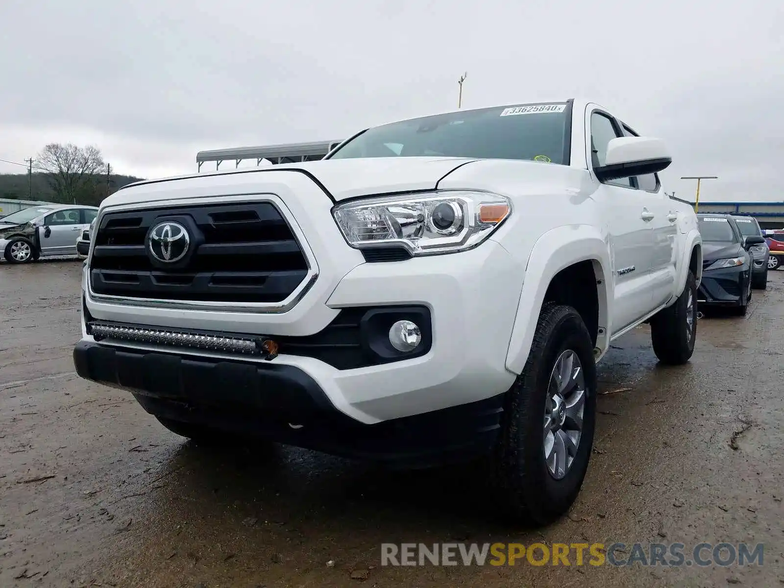 2 Photograph of a damaged car 5TFAZ5CN8KX080236 TOYOTA TACOMA 2019