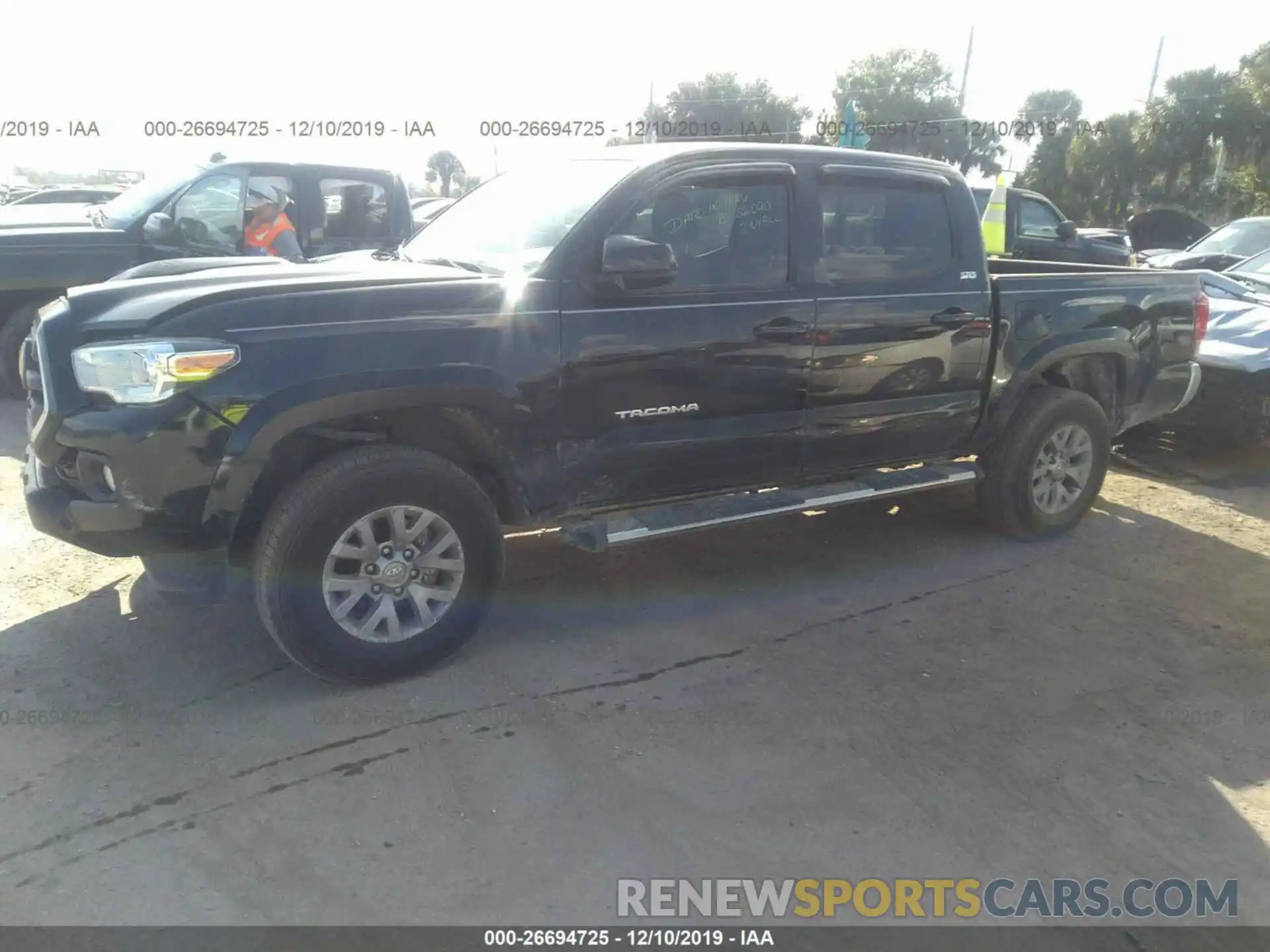 2 Photograph of a damaged car 5TFAZ5CN8KX080317 TOYOTA TACOMA 2019