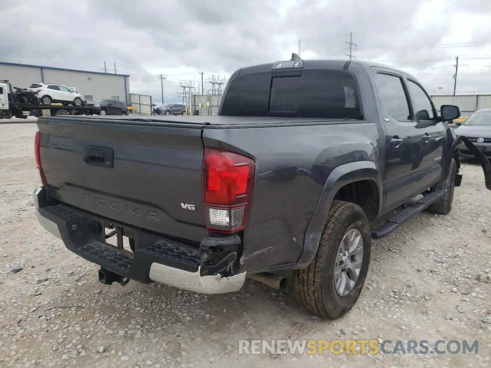 4 Photograph of a damaged car 5TFAZ5CN8KX081189 TOYOTA TACOMA 2019