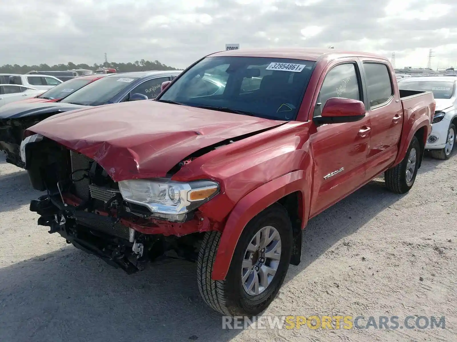 2 Photograph of a damaged car 5TFAZ5CN8KX087221 TOYOTA TACOMA 2019