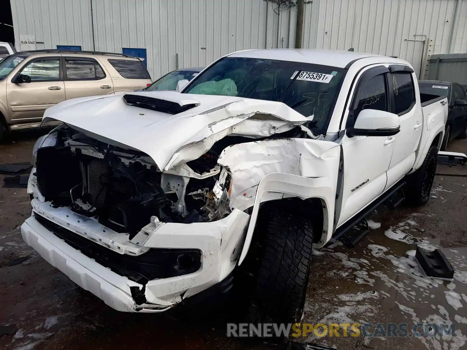 2 Photograph of a damaged car 5TFAZ5CN9KX075479 TOYOTA TACOMA 2019