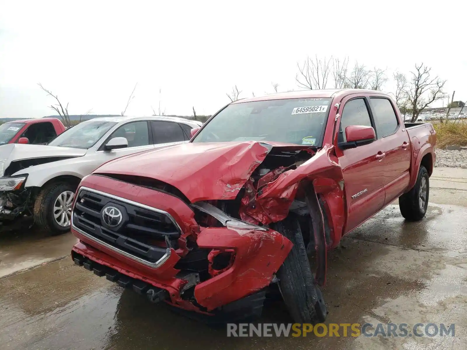 2 Photograph of a damaged car 5TFAZ5CN9KX075627 TOYOTA TACOMA 2019