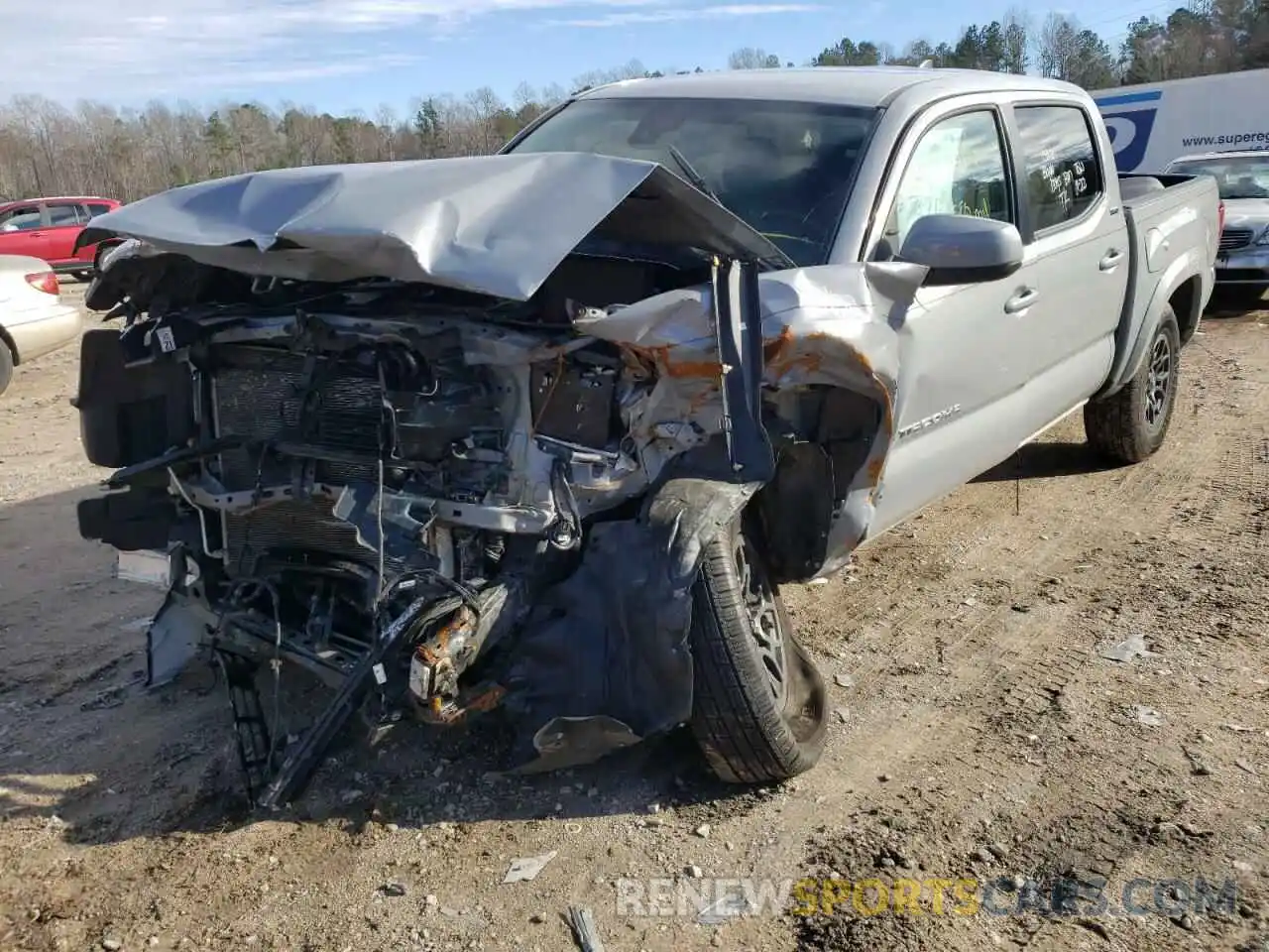 2 Photograph of a damaged car 5TFAZ5CN9KX076177 TOYOTA TACOMA 2019