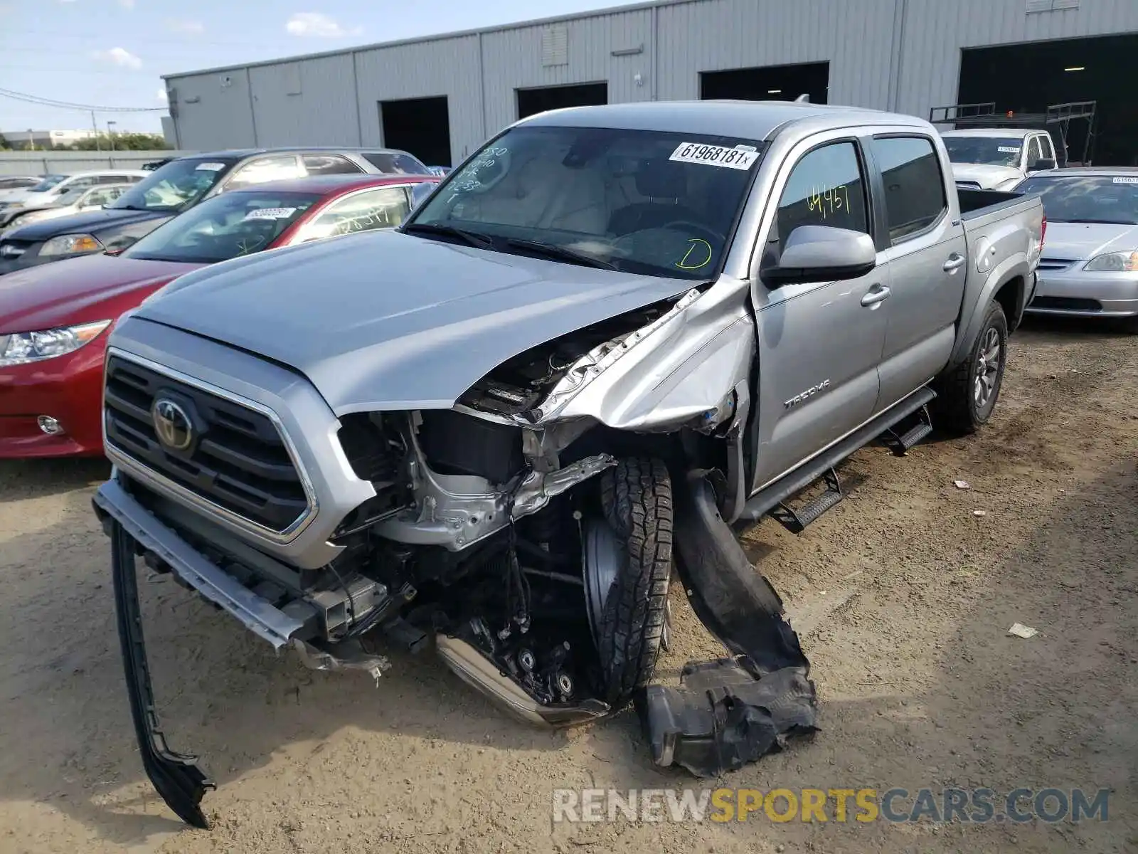 2 Photograph of a damaged car 5TFAZ5CN9KX077233 TOYOTA TACOMA 2019