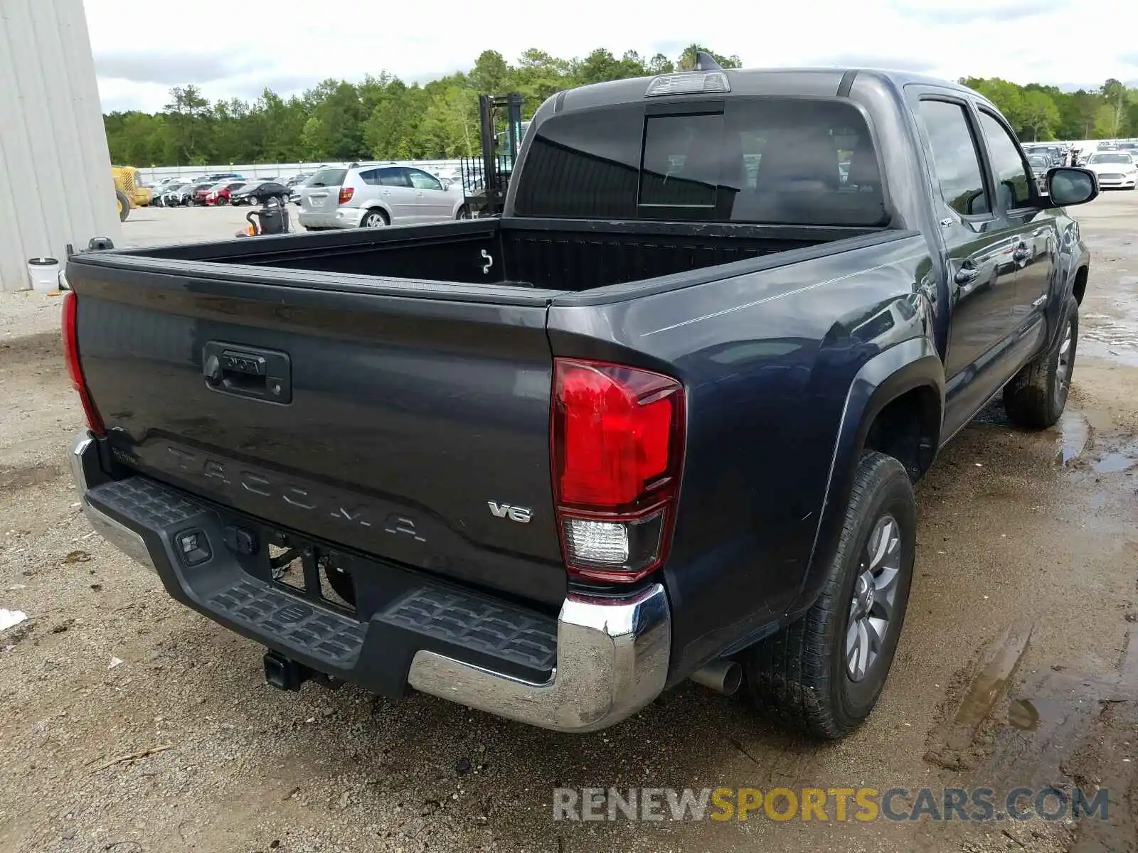 4 Photograph of a damaged car 5TFAZ5CN9KX078351 TOYOTA TACOMA 2019