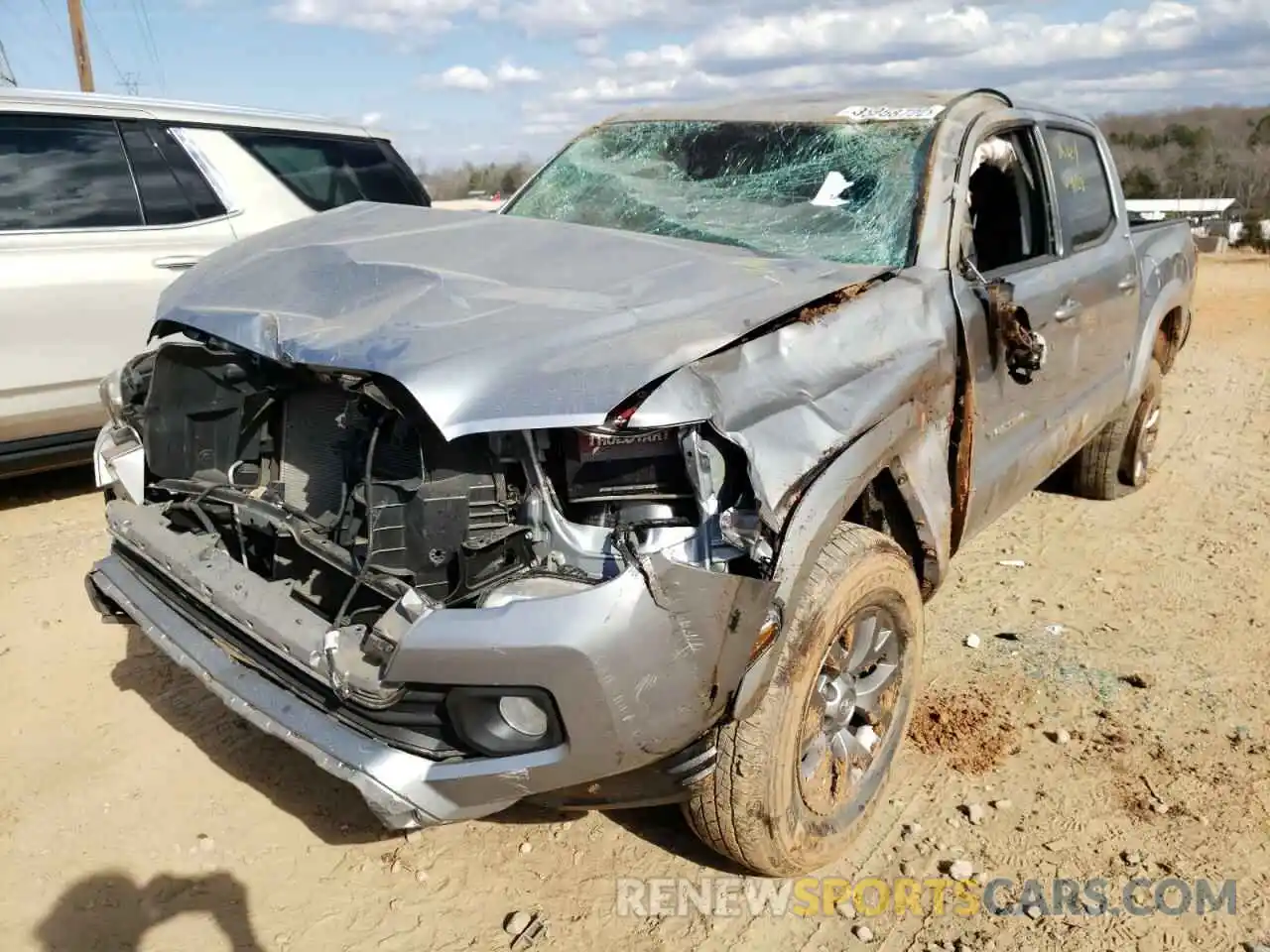 2 Photograph of a damaged car 5TFAZ5CN9KX078379 TOYOTA TACOMA 2019