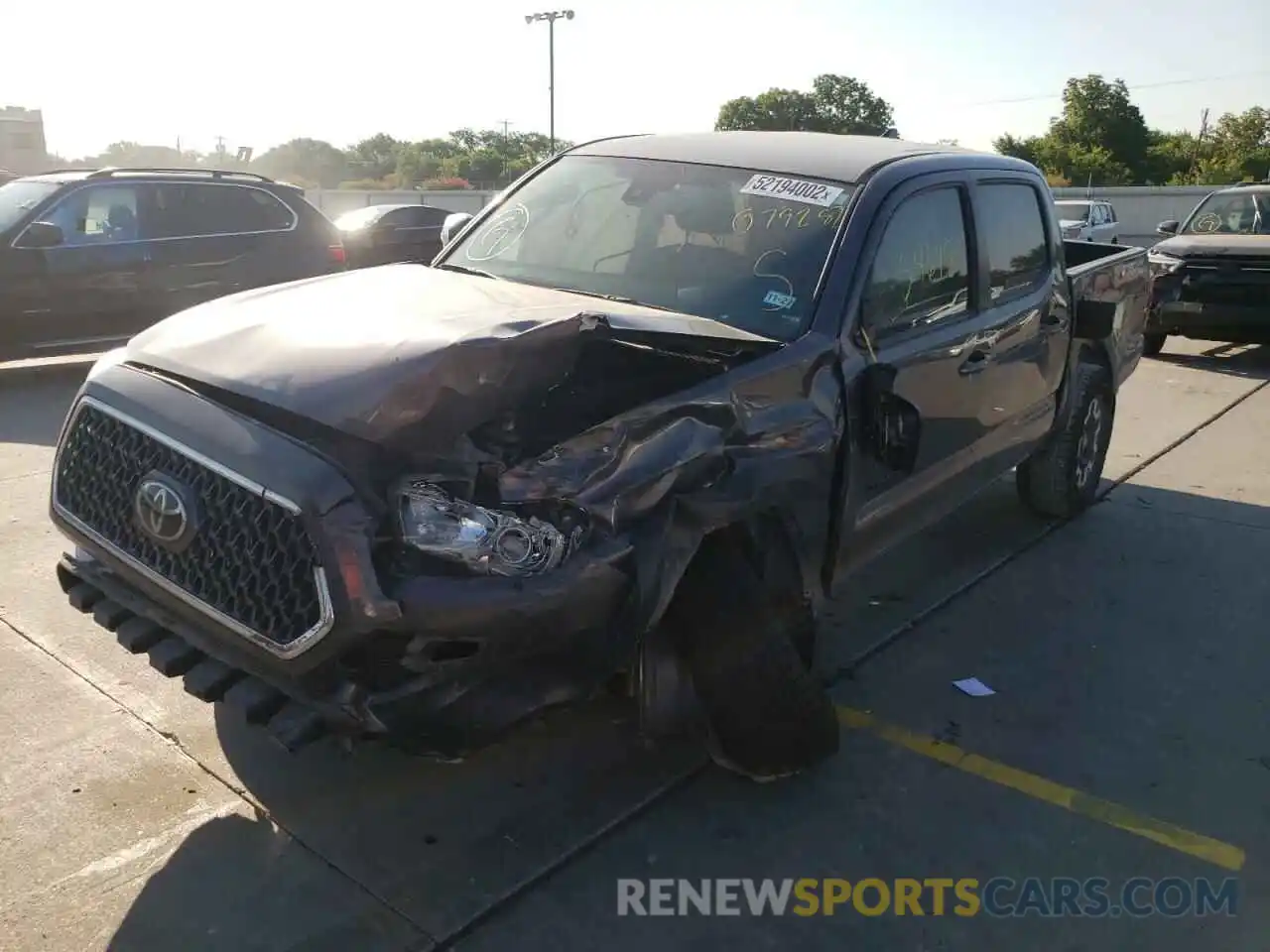 2 Photograph of a damaged car 5TFAZ5CN9KX079287 TOYOTA TACOMA 2019