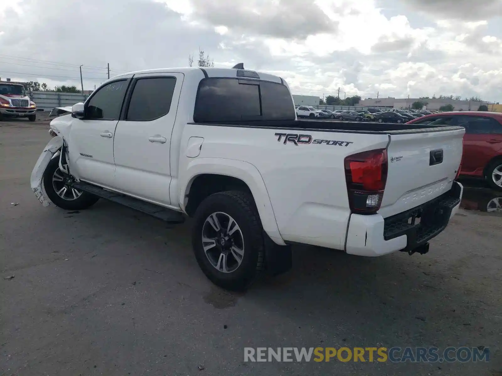 3 Photograph of a damaged car 5TFAZ5CN9KX079354 TOYOTA TACOMA 2019