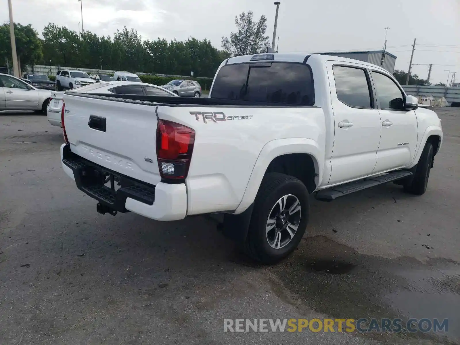 4 Photograph of a damaged car 5TFAZ5CN9KX079354 TOYOTA TACOMA 2019