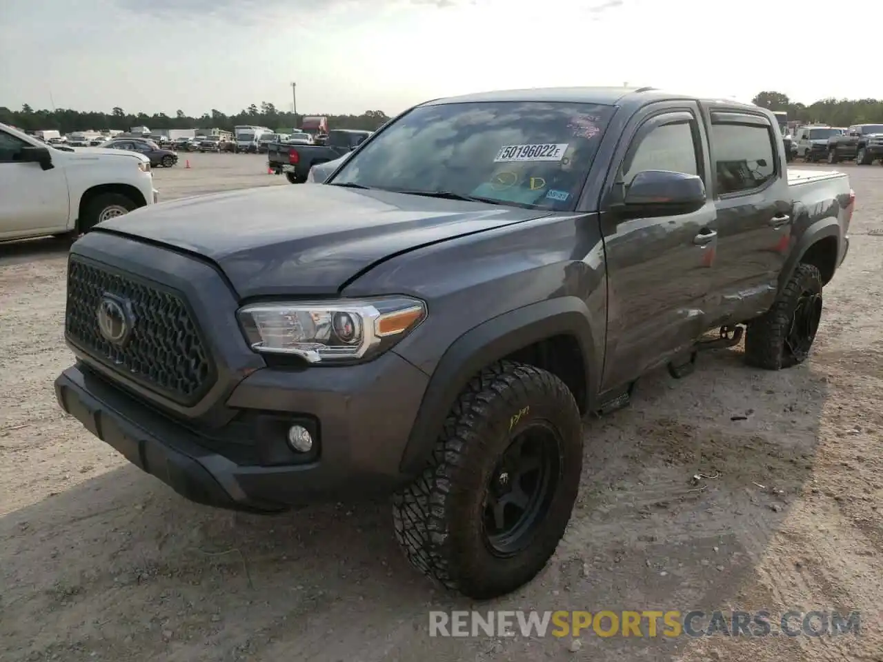 2 Photograph of a damaged car 5TFAZ5CN9KX081654 TOYOTA TACOMA 2019