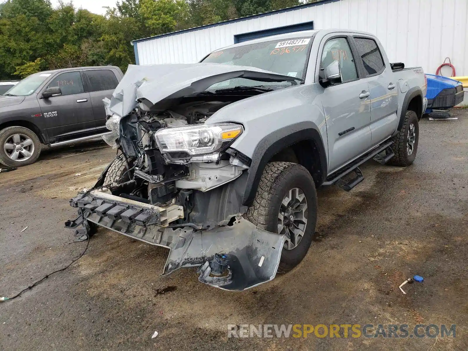 2 Photograph of a damaged car 5TFAZ5CN9KX086577 TOYOTA TACOMA 2019